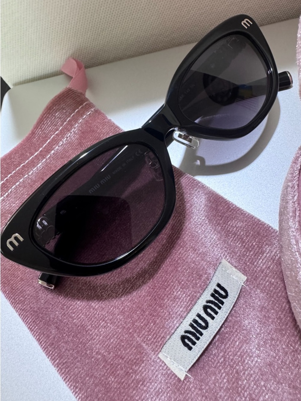 Miu Miu Black Cat-Eye Sunglasses with Pink Velvet Pouch
